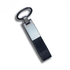 A sleek, rectangular PU strap keyring in black with a metal attachment loop.