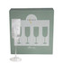 A clear glass champagne flute with a ribbed texture, displayed in front of its green packaging featuring an emblem.