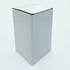 A drink bottle in a plain white box, featuring a square shape and smooth edges. No visible branding.