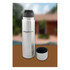 A drink bottle with a silver stainless steel body and black lid, featuring a logo. Includes a matching cup.