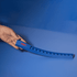 A blue 30cm popper ruler with a hand holding it, featuring a textured popping surface and a logo.