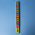 A 30cm popper ruler featuring a vibrant design with blue and multicoloured dots, alongside a logo.