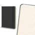 A large black Moleskine hard cover notebook featuring grid pages and an elastic band closure.