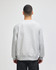 A grey Champion Reverse Weave® adult crew sweatshirt viewed from the back, featuring a simple design and a logo.