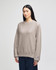A grey Champion Reverse Weave® adult crew sweatshirt is displayed on a model in a neutral setting.