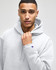 A grey hooded sweatshirt with a front pouch pocket and a brand logo on the sleeve.