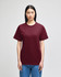 A maroon short-sleeve T-shirt displayed on a model, featuring a small logo on one sleeve.