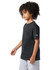 A short sleeve t-shirt in black with a logo on the sleeve, modelled by a child.
