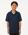 A navy blue youth polo shirt with a collar and short sleeves, featuring a branding logo.