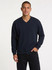 A navy V-neck fleece jumper, featuring long sleeves, worn by a male model. The jumper has a logo.