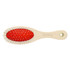 A wooden pet brush with a red rubber grip and metal bristles, featuring a branding logo.