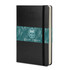A black Moleskine 2027 planner with a decorative band featuring green foliage patterns.