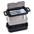 A black lunch box made of stainless steel featuring a transparent lid and a set of white knife and fork.