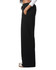 Wide leg pants in black, featuring a drawstring waist and side pockets, showcased from the side view.