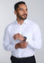 A classic fit long sleeve shirt in white, worn by a man adjusting his cuff, featuring a watch on his wrist.