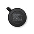 A round black wireless speaker with a textured surface and a hanging loop, featuring technical specifications on the back.