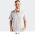 A grey polo shirt with a three-button placket and a logo. The model is smiling while standing against a plain background.