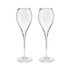 A pair of clear glass flutes with elegant curvy shapes, resting on slender stems. The set features a branding logo.