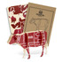 A wooden model of a cow in red and cream, featuring anatomical cuts, accompanied by two instructional booklets.