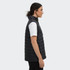 A side view of a women's black puffer vest with a hood, featuring a smooth quilted design.