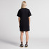 A black oversized dress with short sleeves, shown from the back, featuring a casual fit and a simple design.