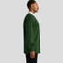 A green rugby jersey with a white collar, featuring long sleeves and a fitted design, displayed from the side.