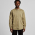 A button-up shirt in a khaki colour, featuring a single chest pocket and a collar, presented on a model.