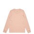 A long-sleeve t-shirt in a soft peach colour, featuring a plain design and a round neckline. It has branding on the tag.