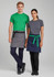 A green shirt and grey shirt model wear a grey waist apron with a black belt and a navy apron with a green belt.