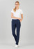 A pair of women's navy stretch pants with a slim fit, paired with a white polo shirt and white sneakers.
