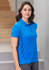 A blue short sleeve polo shirt with a sleek design and a logo on the chest, showcased by a model.