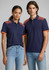 A navy blue short sleeve polo shirt with orange accents and a patterned design on the shoulders, featuring a logo.