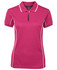 A women's pink polo shirt with white piping, featuring a collar and short sleeves. The shirt has a logo.