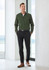 A green long sleeve button-up shirt worn with black pants and brown shoes, featuring a simple logo.