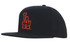 A black A-frame cap with an embroidered logo in red. It features a flat brim and a structured design.