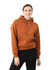 A brown kangaroo pocket hoodie featuring a relaxed fit and drawstring hood, modelled by a woman.