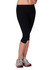 Black 3/4 leggings made from cotton and spandex, featuring a fitted design and paired with athletic shoes.
