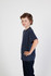 A navy blue kids' crew neck T-shirt displayed on a child, featuring short sleeves and a relaxed fit.