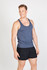 A navy athletic T-back singlet worn by a smiling man, paired with black shorts. The singlet has a logo on it.