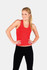 A red women's singlet featuring a fitted design, paired with black leggings. The garment has a logo.