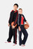 A man and woman pose in black and navy striped track pants, each holding a basketball. The outfits feature sporty jackets.