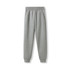 A pair of women's track pants in light grey, featuring an elastic waistband and side pockets.