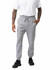 Men's three-layer cotton sandwich pants in grey, featuring an elastic waistband and side pockets. Model wears a white t-shirt.