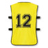 A bright yellow training bib featuring a large black number 12 and adjustable black straps on the sides.