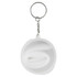 A round keychain with a silver ring and a white silicone straw coiled inside a transparent case.