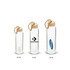 A drink bottle featuring a clear glass body and a bamboo lid, with a rope handle. It includes branding.