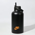 A black drink bottle with a flip-top lid and a logo. It has a matte finish and holds 1.8 litres.