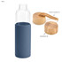 A drink bottle with a blue silicone sleeve, featuring a clear glass body and two wooden lids.