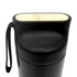 A drink bottle in matte black with a bamboo top and a side loop for easy carrying.