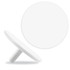 A white golf ball marker with a flat circular design and a small stem for easy placement.